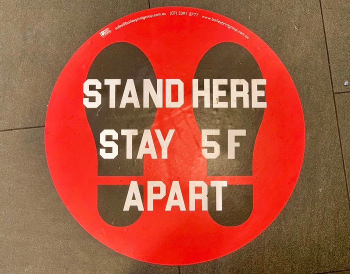 Stand Here Stay 5F Apart Floor Graphics Made by The Sign Doctor in Woburn, MA